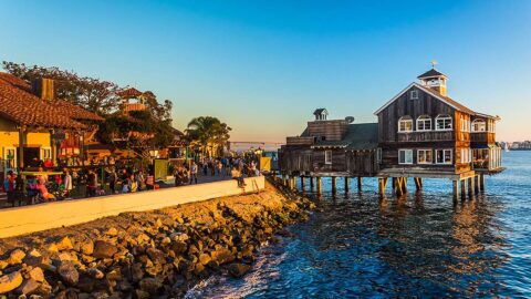 The historic carousel at Seaport Village with the bay in the background.