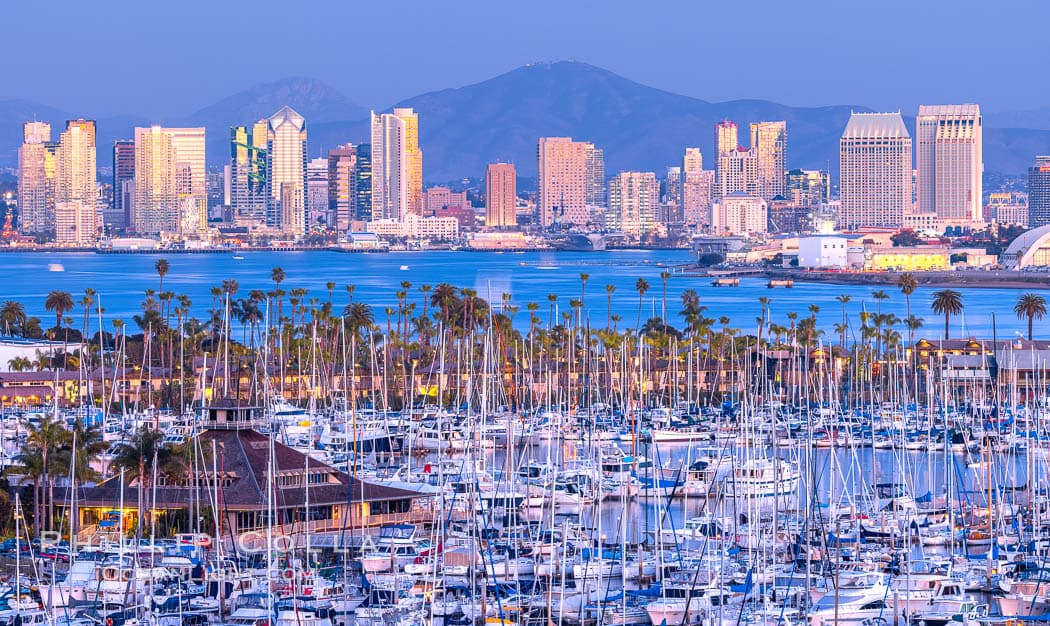 San Diego marina and downtown skyline at a warm, vibrant sunset.